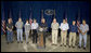 President George W. Bush stands with his economic advisors as he addresses a news conference, Tuesday, Aug. 9, 2005 at the Bush Ranch in Crawford, Texas, following a meeting to discuss the strength of the U.S. economy. From left to right are Dr. Ben Bernanke, chairman of the Council of Economic Advisers; U.S. Trade Representative Rob Portman; U.S. Secretary of Labor Elaine Chao; U.S. Secretary of Agriculture Mike Johanns; U.S. Treasury Secretary John Snow; U.S. Commerce Secretary Carlos Gutierrez; OMB Director Josh Bolten and assistant to the President on economic policy, Allan B. Hubbard. White House photo by Paul Morse