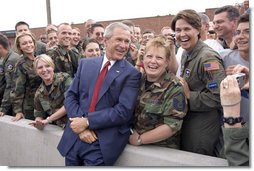 After addressing the Veterans of Foreign Wars national convention, President George W. Bush chats with troops from the Utah National Guard shortly before departing Salt Lake City, Utah, August 22, 2005. White House photo by Paul Morse