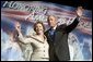 President George W. Bush and Laura Bush wave to the crowd of military families, Wednesday, Aug. 24, 2005 at the Idaho Center Arena in Nampa, Idaho, following the President's speech honoring the service of National Guard and Reserve forces serving in Afghanistan and Iraq. White House photo by Paul Morse