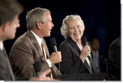 President George W. Bush shares a laugh with Myrtle Jones during a Conversation on Medicare Monday, Aug. 29, 2005, at the James L. Brulte Senior Center in Rancho Cucamonga, Calif.  White House photo by Paul Morse