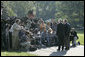 President George W. Bush and Michael Chertoff, Secretary of Homeland Security, talk with the media Friday, Sept. 2, 2005, on the South Lawn of the White House. The President briefed the press on hurricane disaster relief before departing for a tour of the Gulf Coast area hit by Hurricane Katrina. White House photo by Paul Morse