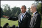 President George W. Bush and Secretary Michael Chertoff of the Department of Homeland Security, brief the media Friday, Sept. 2, 2005, on disaster relief in the wake of Hurricane Katrina. The President left the White House afterwards to fly to the stricken area. White House photo by Paul Morse