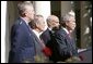 President George W. Bush speaks to the nation during a weekly radio address, live from the Rose Garden at the White House in Washington, D.C., September 3, 2005. Accompanying the president are (L to R) Chairman of the Joint Chiefs of Staff, General Richard Myers, Secretary of Defense Donald Rumsfeld and Homeland Secretary Michael Chertoff. White House photo by Paul Morse