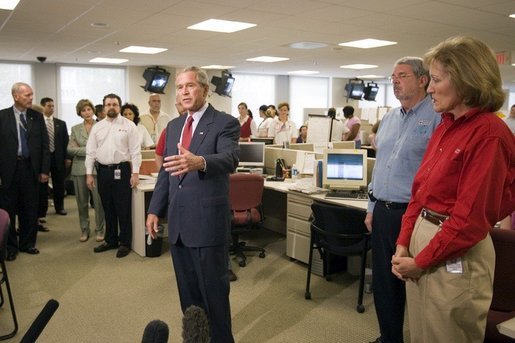 President George W. Bush addresses the press during a visit of the Red Cross in Washington, D.C. on Sunday September 4, 2005. The President and Mrs. Laura Bush visited Red Cross headquarters to view relief efforts in the aftermath of hurricane Katrina. White House photo by Paul Morse