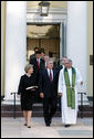 President Bush and First Lady Laura Bush walk with Rev. Luis Leon after attending a Service of Prayer and Remembrance for 9/11 victims at St. John's Episcopal Church in Washington, DC, September 11, 2005. This marks the fourth anniversary of terrorist attacks on both the World Trade Center and The Pentagon. White House photo by David Bohrer