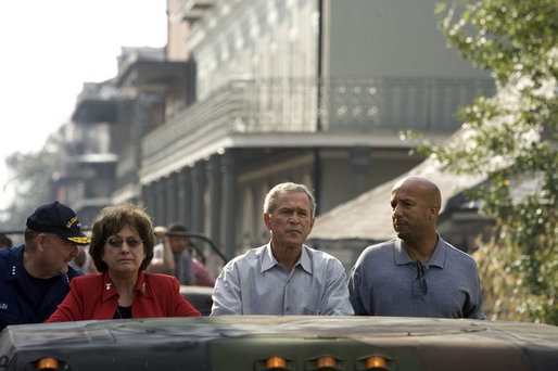 President George W. Bush tours a hurricane ravaged neighborhood of New Orleans, La., from the back of a truck with Gov. Kathleen Blanco and Mayor C. Ray Nagin, Monday, Sept. 12, 2005. White House photo by Paul Morse