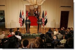 President George W. Bush and Iraq's President Jalal Talabani face the press during a joint availability Tuesday, Sept. 13, 2005, in the East Room of the White House.  White House photo by Shealah Craighead