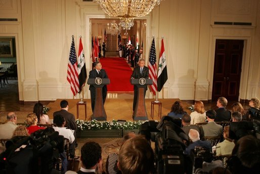 President George W. Bush and Iraq's President Jalal Talabani face the press during a joint availability Tuesday, Sept. 13, 2005, in the East Room of the White House. White House photo by Shealah Craighead