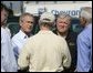 President George W. Bush receives a briefing from Chevron Refinery Manager Roland Kell with Mississippi Governor Haley Barbour at the Chevron Pascagoula Refinery in Mississippi, Thursday, Sept. 15, 2005. White House photo by Eric Draper