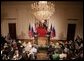 President George W. Bush and Russian President Vladimir Putin appear together at a joint news conference in the East Room of the White House, Friday, Sept. 16, 2005 in Washington. White House photo by Eric Draper