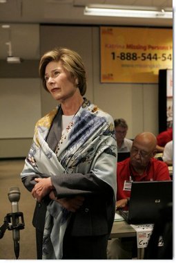 Laura Bush talks with the press during her visit to the National Center for Missing & Exploited Children in Alexandria, Va., Friday, Sept. 16, 2005.  White House photo by Krisanne Johnson