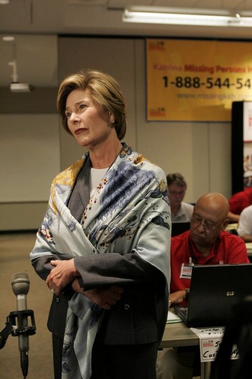 Laura Bush talks with the press during her visit to the National Center for Missing & Exploited Children in Alexandria, Va., Friday, Sept. 16, 2005. White House photo by Krisanne Johnson