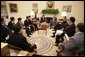 President George W. Bush meets with Thailand's Prime Minister Thaksin Shinawatra, during a visit to the Oval Office at the White House, Monday, Sept. 19, 2005 in Washington. White House photo by Eric Draper