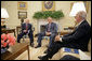 President George W. Bush meets with former President Jimmy Carter and Secretary of State James Baker, Co-Chairs of the Carter-Baker Commission on Federal Election Reform, in the Oval Office Monday, Sept. 19, 2005. White House photo by Eric Draper