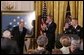 Korean War era veteran Corporal Tibor "Ted" Rubin, receives a standing ovation, after being presented the Medal of Honor by President George W. Bush, Friday, Sept. 23, 2005 at cermonies at the White House in Washington. Rubin was honored for his actions under fire, and his bravery while in captivity at a Chinese POW camp. White House photo by Krisanne Johnson