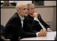 President George W. Bush and Homeland Security Secretary Michael Chertoff receive a briefing on Hurricane Rita Friday, Sept. 23, 2005 inside NORAD's U.S. Northern Command at Peterson Air Force Base in Colorado Springs, Colorado. White House photo by Eric Draper