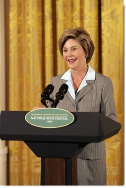 Laura Bush speaks at the National Book Festival Author's breakfast in the East Room, Saturday, Sept. 24, 2005. "Great books have brought many people through difficult times," said Mrs. Bush, explaining that the Book Festival is collecting books for schools, libraries and those affected by the recent hurricanes. "A story's setting -- real or imagined -- can provide a much-needed escape. And the characters in a good book are like old friends by the time we turn the final page."  White House photo by Krisanne Johnson