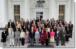 Laura Bush stands with guests of the National Book Festival Author's breakfast on the North Portico of the White House Saturday, Sept. 24, 2005.  White House photo by Krisanne Johnson