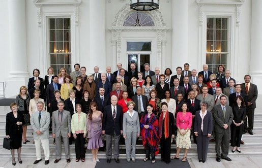 Laura Bush stands with guests of the National Book Festival Author's breakfast on the North Portico of the White House Saturday, Sept. 24, 2005. White House photo by Krisanne Johnson