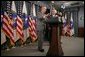 President George W. Bush, appearing at the U.S. Department of Energy, Monday, Sept. 26, 2005 in Washington, talks about the effects of Hurricane Rita on the energy situation in the Gulf of Mexico. President Bush is joined by U.S. Energy Secretary Samuel W. Bodman and U.S. Interior Secretary Gale Norton. White House photo by Paul Morse