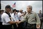 President George W. Bush greets members of the Ohio Urban Search and Rescue Unit during his visit Tuesday, Sept. 27, 2005 to Lake Charles, La. It was the President's seventh visit to the Gulf Coast area since Hurricane Katrina. White House photo by Eric Draper