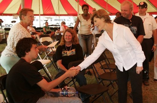 Laura Bush meets with people while visiting a medical and food distribution site, Tuesday, Sept. 27, 2005 in Biloxi, Miss. White House photo by Krisanne Johnson