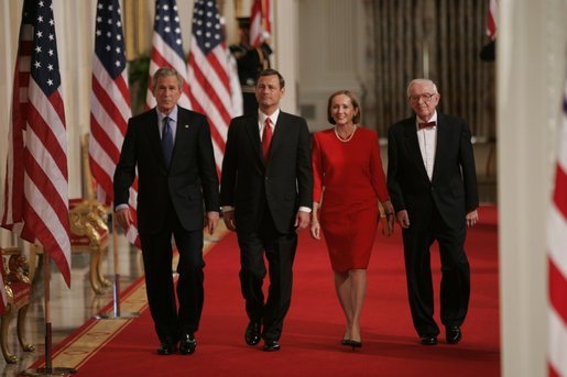 President George W. Bush walks with Judge John Roberts, his wife, Jane Marie Sullivan Roberts, and Associate Justice John Paul Stevens to the East Room of the White House Thursday, Sept. 29, 2005, where Judge Roberts was sworn in as Chief Justice of the United States. White House photo by Paul Morse