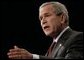 President George W. Bush addresses his remarks on the War on Terror, Thursday, Oct. 6, 2005, speaking before the National Endowment for Democracy at the Ronald Reagan Building and International Trade Center in Washington. White House photo by Eric Draper