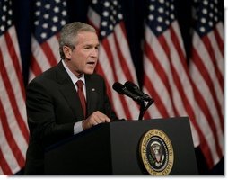 President George W. Bush addresses his remarks on the War on Terror, Thursday, Oct. 6, 2005, speaking before the National Endowment for Democracy at the Ronald Reagan Building and International Trade Center in Washington.  White House photo by Eric Draper