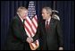 President George W. Bush shakes hands with William F. Buckley, Jr., Thursday, Oct. 6, 2005 at the Eisenhower Executive Office Building in Washington, to honor the 50th anniversary of National Review magazine, which was founded by Buckley, and to recognize Buckley's upcoming 80th birthday. White House photo by Paul Morse