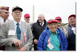 Vice President Dick Cheney poses for a photo with veterans from the 526th Armored Infantry Battalion Friday, Oct. 7, 2005, after delivering remarks during a wreath -laying ceremony at the National World War II Memorial in Washington D.C. "I count it a privilege to stand in the presence of men who were sent into battle by President Franklin D. Roosevelt.and who, by your courage and honor and devotion to duty, helped to win a war and change the course of history", said the Vice President to the soldiers, widows, and family members of the 526th Armored Infantry Battalion who attended the ceremony. The 526th AIB is the sole remaining, separate armored infantry battalion from World War II, whose soldiers defended the Belgian villages of Stavelot and Malmedy on December 16, 1944, the first day of the Battle of the Bulge.  White House photo by David Bohrer