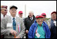 Vice President Dick Cheney poses for a photo with veterans from the 526th Armored Infantry Battalion Friday, Oct. 7, 2005, after delivering remarks during a wreath -laying ceremony at the National World War II Memorial in Washington D.C. "I count it a privilege to stand in the presence of men who were sent into battle by President Franklin D. Roosevelt.and who, by your courage and honor and devotion to duty, helped to win a war and change the course of history", said the Vice President to the soldiers, widows, and family members of the 526th Armored Infantry Battalion who attended the ceremony. The 526th AIB is the sole remaining, separate armored infantry battalion from World War II, whose soldiers defended the Belgian villages of Stavelot and Malmedy on December 16, 1944, the first day of the Battle of the Bulge. White House photo by David Bohrer