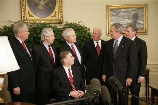 President George W. Bush meets with former justices of the Texas Supreme Court Monday, Oct. 17, 2005, in the Oval Office of the White House. From left are: Former Associate Justice Eugene Cook; former Associate Justice Raul Gonzalez; Texas Attorney General and former Associate Justice Greg Abbott, seated; former Texas Chief Justice John Hill; former Associate Justice James Baker; the President, and former Associate Justice Craig Enoch. White House photo by Eric Draper