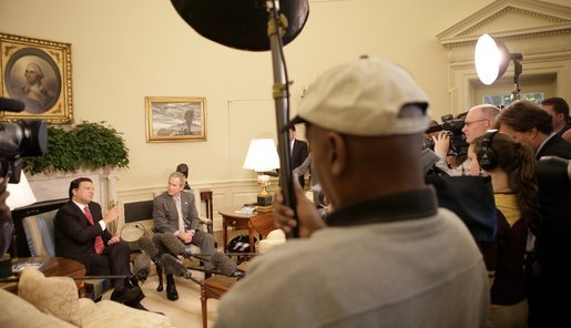 President George W. Bush and José Barroso, President of the Commission of the European Communities, meet the media during a photo opportunity Tuesday, Oct. 18, 2005, in the Oval Office of the White House. White House photo by Eric Draper