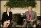 President George W. Bush and U.S. Secretary of Education Margaret Spellings meet with reporters, Wednesday, Oct. 19, 2005 in the Oval Office at the White House to discuss the Nation's Report Card. White House photo by Eric Draper