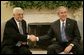 President George W. Bush welcomes Mahmoud Abbas, President of the Palestinian Authority, to the Oval Office Thursday, Oct. 20, 2005. White House photo by Eric Draper