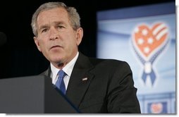 President George W. Bush speaks to the Joint Armed Forces Officers' Wives Luncheon Tuesday, Oct. 25, 2005, at Bolling Air Force Base in Washington, D.C. The President thanked the members for their courage and sacrifice saying, "We don't know the course our own struggle will take or the sacrifices that might lie ahead. We do know the strength and character that our troops and military families bring to the fight."  White House photo by Paul Morse