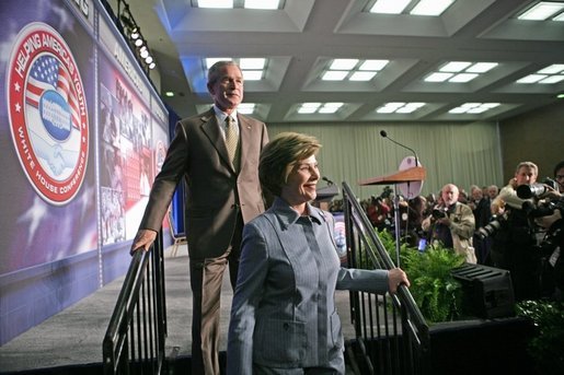 President George W. Bush and Laura Bush attend the White House Conference on Helping America's Youth, Thursday, Oct. 27, 2005 at Howard University in Washington. White House photo by Paul Morse