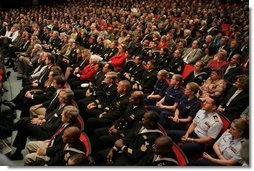 An audience listens to President George W. Bush, Friday, Oct. 28, 2005 at Chrysler Hall in Norfolk, Va., speaking on the successes and challenges in fighting the war on terror.  White House photo by Paul Morse