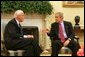 President George W. Bush sits with Donald Powell, Chairman of the Federal Deposit Insurance Corp., in the Oval Office Tuesday, Nov. 1, 2005. The President selected Mr. Powell to be the coordinator of federal support for the Gulf Coast's recovery and rebuilding. White House photo by Shealah Craighead