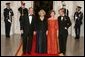 President George W. Bush and Laura Bush welcome the Prince of Wales and Duchess of Cornwall upon their arrival to the White House, Wednesday evening, Nov. 2, 2005. White House photo by Paul Morse