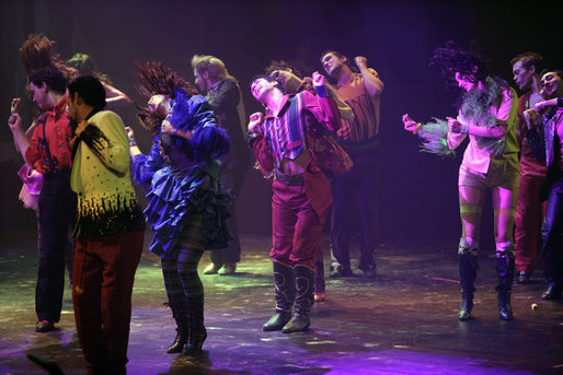 Performers move under the lights at Teatro Auditorium Friday, Nov. 4, 2005, as the opening ceremonies of the 2005 Summit of the Americas got under way in Mar del Plata, Argentina. White House photo by Eric Draper