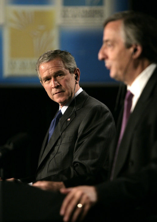 President George W. Bush listens to Argentina's President Nestor Carlos Kirchner as the two hold a joint press availability Friday, Nov. 4, 2005, at the Hermitage Hotel in Mar del Plata, Argentina. White House photo by Eric Draper