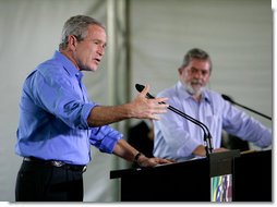 President George W. Bush speaks during a joint press statement with Brazilian President Luiz Inacio Lula da Sliva at the Granja do Torto in Brasilia, Brazil, Sunday, Nov. 6, 2005. White House photo by Paul Morse