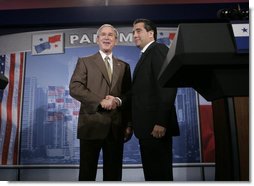 President George W. Bush greets President Martin Torrijos of Panama at the end of a joint press availability with the at Casa Amarilla in Panama City, Panama, Monday, Nov. 7, 2005. White House photo by Eric Draper