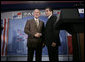 President George W. Bush greets President Martin Torrijos of Panama at the end of a joint press availability with the at Casa Amarilla in Panama City, Panama, Monday, Nov. 7, 2005. White House photo by Eric Draper