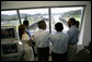 President George W. Bush tours the command center of the Panama Canal's Miraflores Locks with President Martin Torrijos of Panama in Panama City, Panama, Monday, Nov. 7, 2005. White House photo by Eric Draper