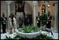 President George W. Bush and Mrs. Bush are welcomed Monday, Nov. 7, 2005, by Panama's President Martin Torrijos and his wife, Vivian, -- and a pet bird -- at the Palacio de Las Garzas in Panama City, Panama. White House photo by Krisanne Johnson