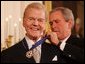 President George W. Bush presents the Presidential Medal of Freedom to legendary radio personality Paul Harvey, one of 14 recipients of the 2005 Presidential Medal of Freedom, awarded Wednesday, Nov. 9, 2005 in the East Room of the White House. White House photo by Shealah Craighead