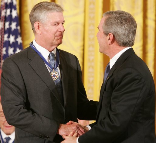 President George W. Bush shakes the hand of Gen. Richard Myers, recently retired Commander of the Joint Chiefs of Staff, after presenting him with the Presidential Medal of Freedom during ceremonies Wednesday, Nov. 9, 2005, at the White House. White House photo by Paul Morse